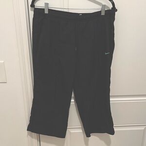 Nike Women's Black Joggers with Green Logo